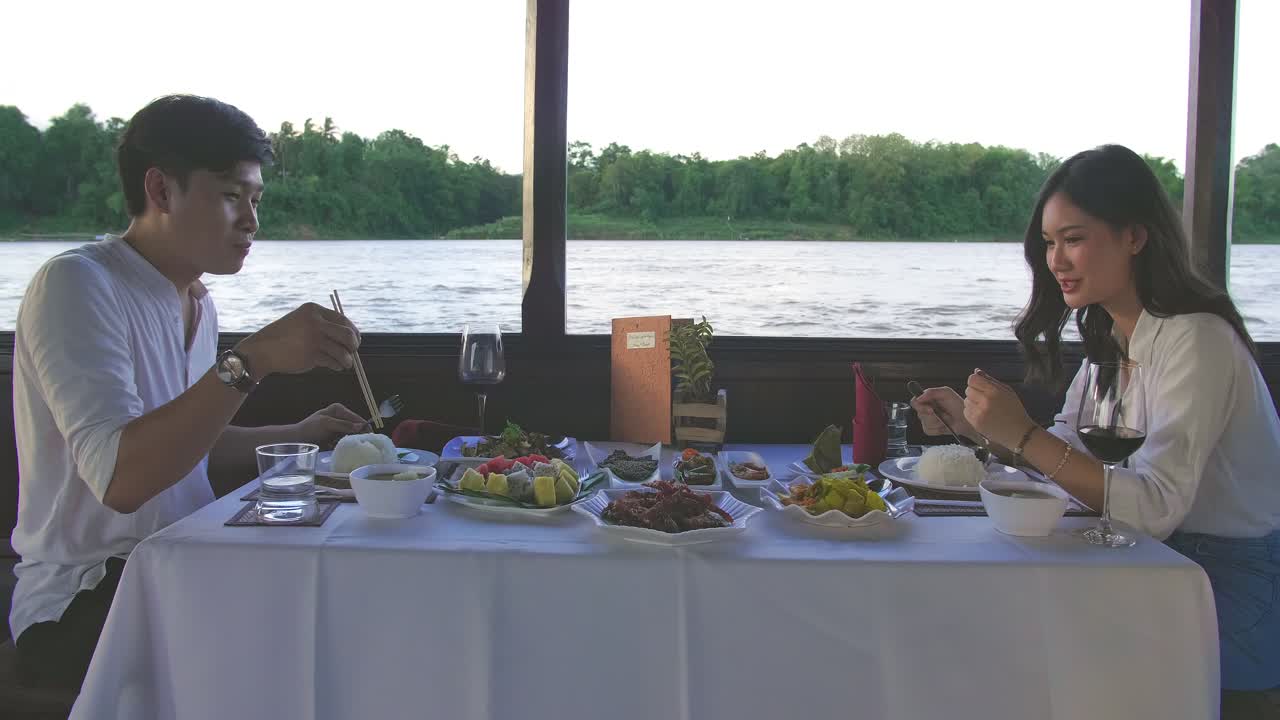 Couple Eating Food On Boat With Good View, Video In 4K