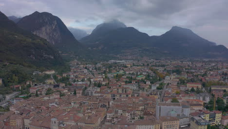 dolly out aerial shot of old, historic, riva del garda town, lombardy, italy