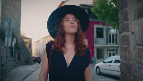 girl walks down a typical street in the city of viseu slow motion