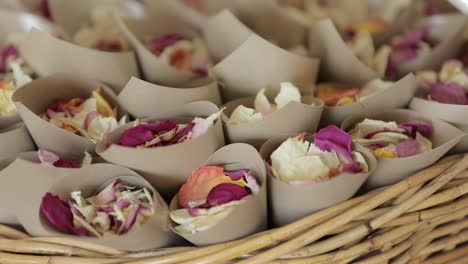 Flower-petal-confetti-in-paper-holders-for-wedding-celebration