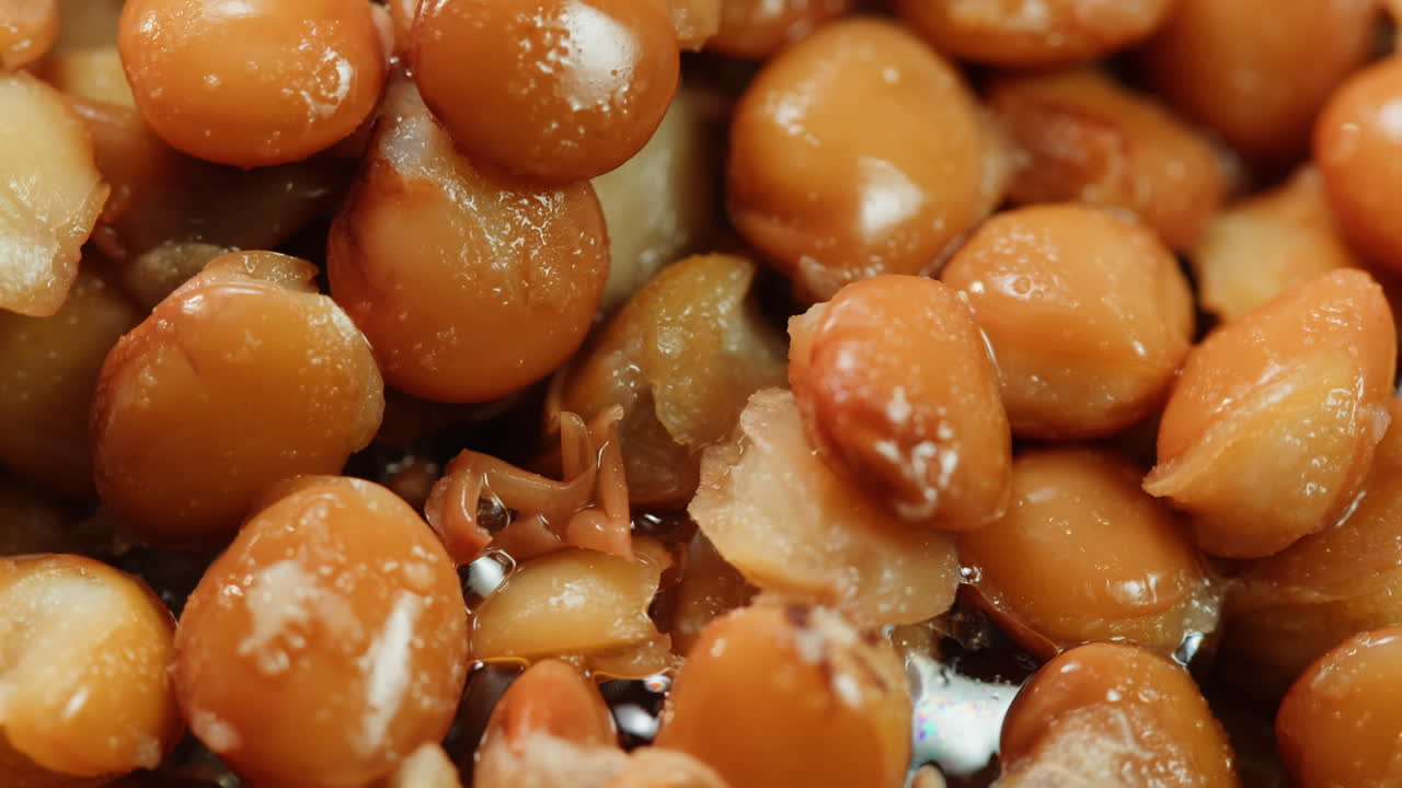 Lentils macro, Open metal can with preserved steamed brown lentils close up isolated on white background