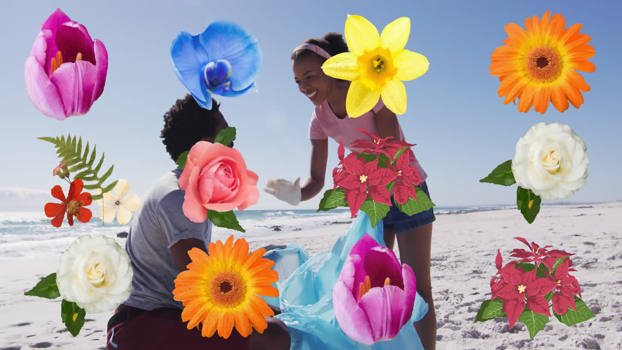 animación de flores sobre feliz hombre y mujer afroamericanos recogiendo basura de la playa