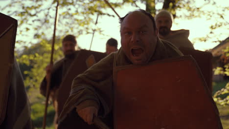 ancient roman warriors in battle reenactment