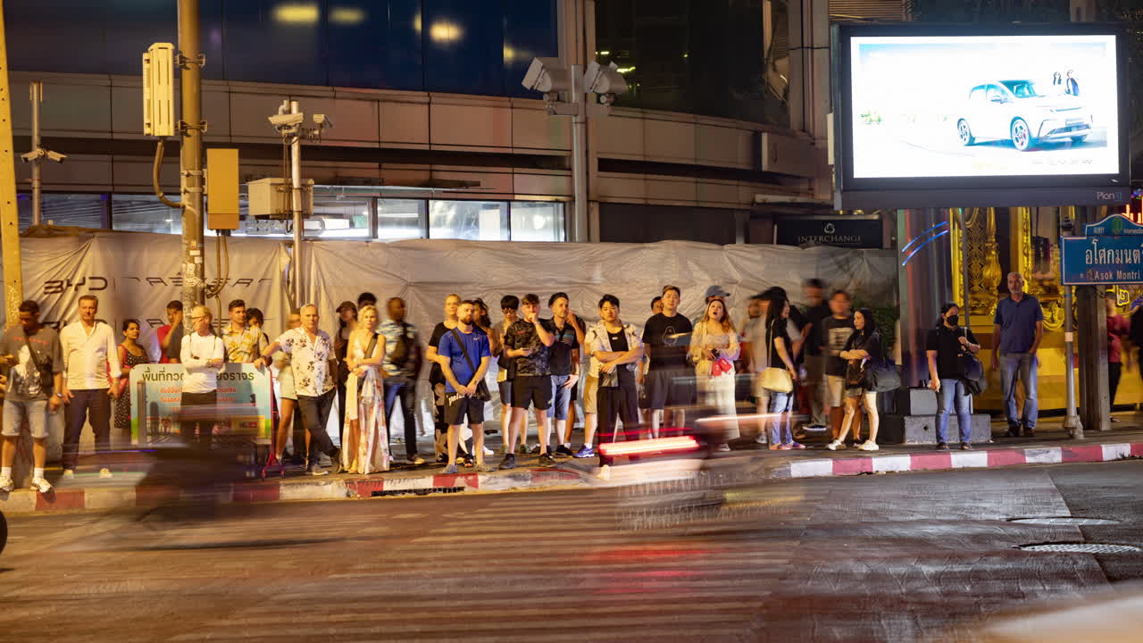 timelapse of rush hour traffic in central bangkok at night