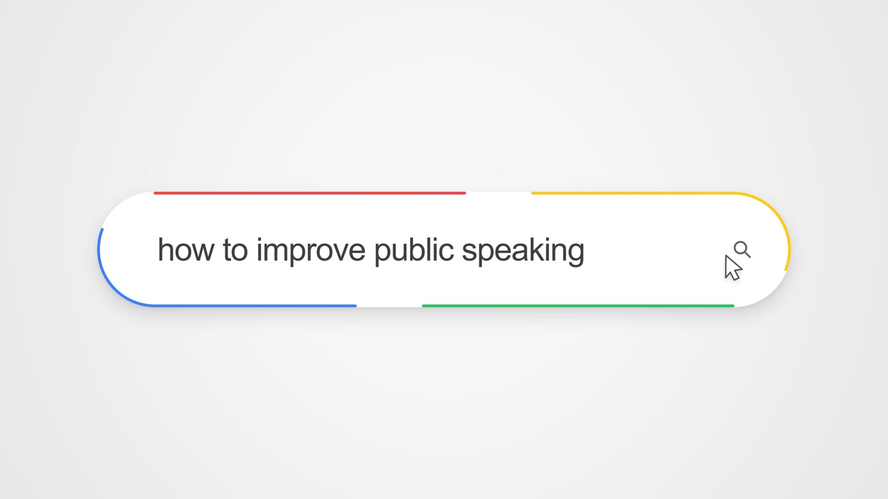 Primo piano della digitazione di "come migliorare il public speaking" in una barra di ricerca online, che illustra la ricerca sulla comunicazione.
