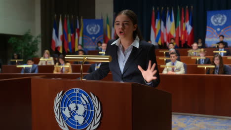 young woman speaking at a youth international conference