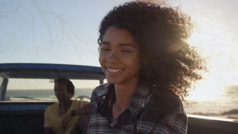 animation of tree over african american couple smiling