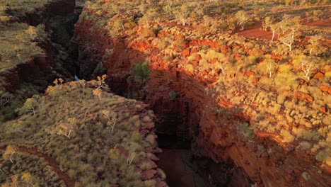 joffre gorge at karijini national park during sunset in western australia, aerial dynamic