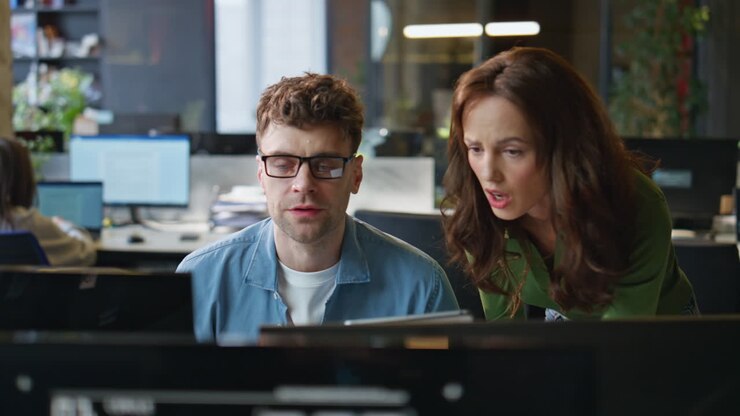 Project managers discussing ideas in office closeup. Businesswoman explaining