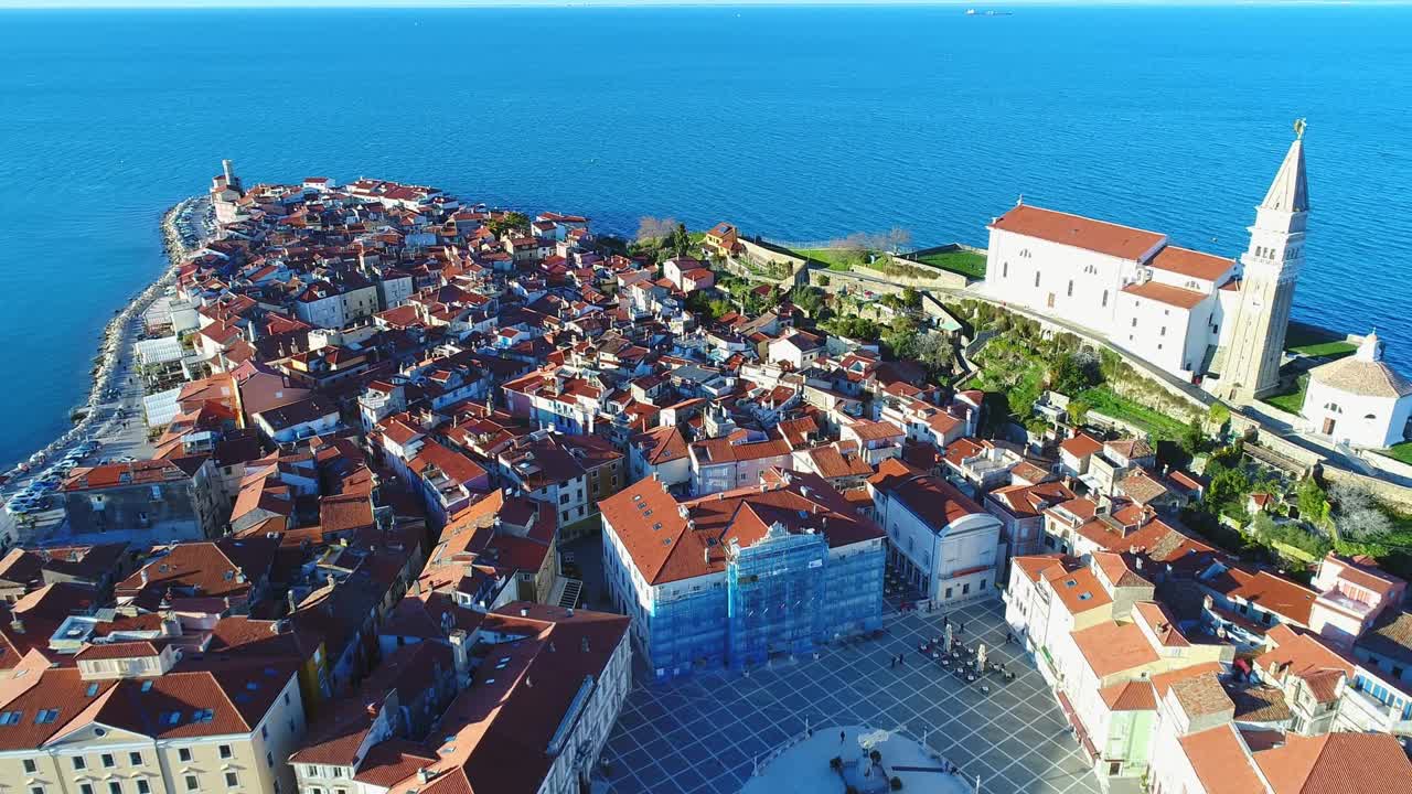 Birds eye view showing medieval architecture of Piran town at Adriatic sea, with narrow streets and compact houses. Slovenia. Aerial