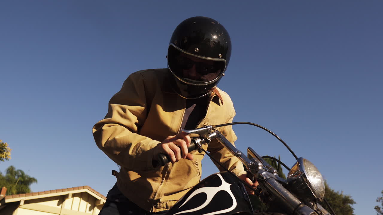 Biker riding a chopper cruiser motorcycle