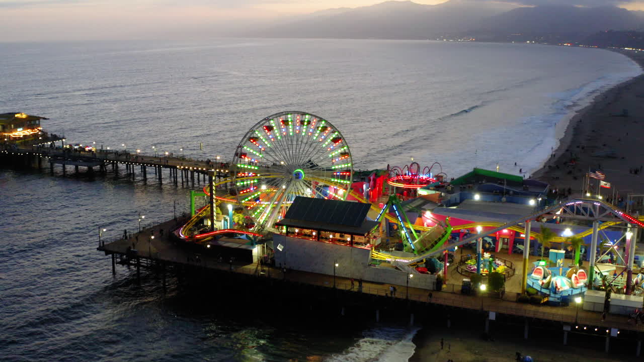 Santa Monica Pier at Dusk with Illuminated Rides