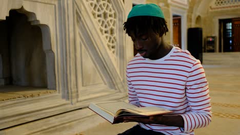 Muslim-man-reading-holy-book