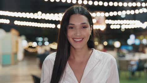 smiling woman at night market