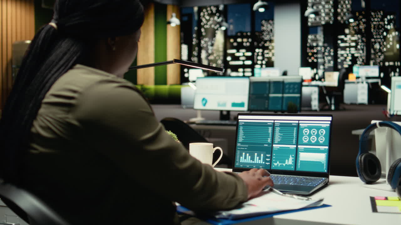 Female office employee handling administrative tasks and planning meetings