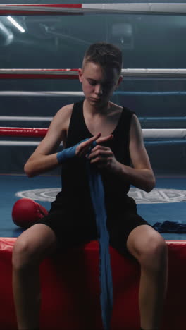 young boxer preparing for training