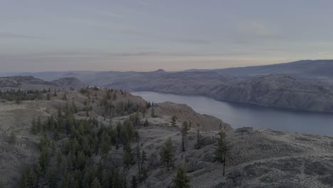 drone horizons: grassland cliffs framing the beauty of kamloops lake