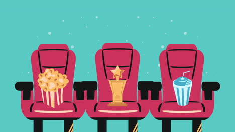 movie theater seats with popcorn, drink, and trophy