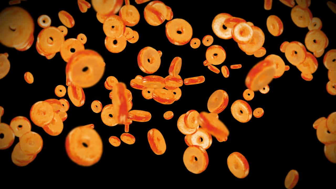 volando muchas rosquillas planas en fondo negro. pastel de rosquillas, dulces, postre. animación en 3d de la rotación de las rosquillas. animación de bucle.