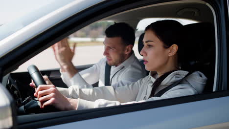 driving school teacher with student