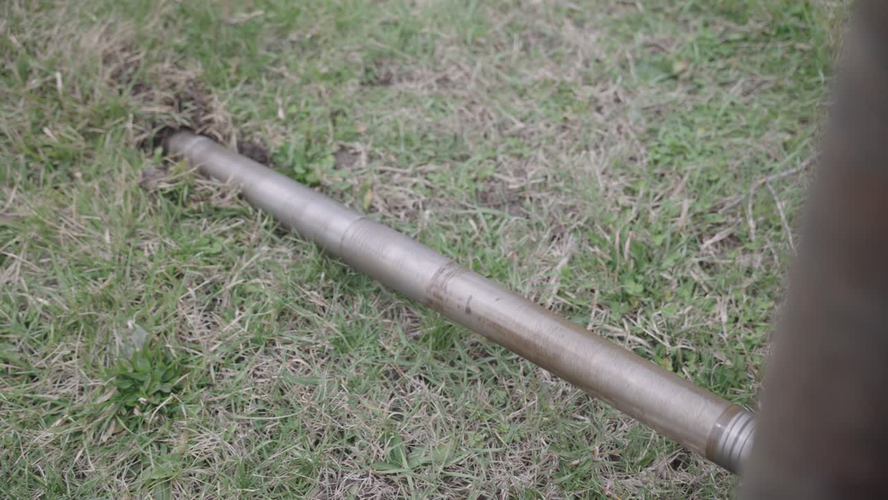 Spinning dig head on a fiber line ditch witch laying cable on a job site