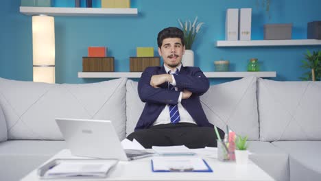 Tired-and-bored-of-work,-man-plays-with-paper-airplane.