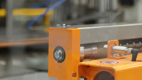 industrial automatic hydraulic press working, close up view