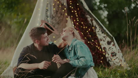 modern rustic couple laughing and smiling while embracing outdoors 8