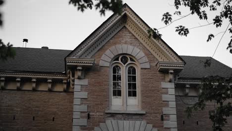 beautiful reveal of a luxurious stone mansion with a gorgeous from yard garden at the strathmere resort, spa and wedding events center in ottawa, ontario, canada