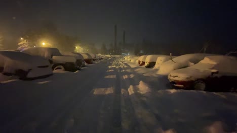 crazy snowstorm engulfs parked cars