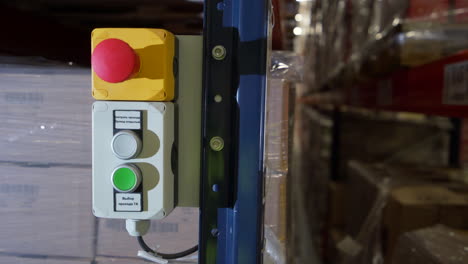 warehouse control panel with emergency stop button