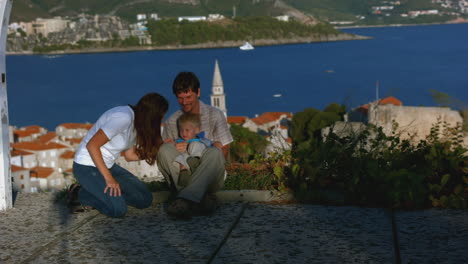 family enjoying a scenic coastal view