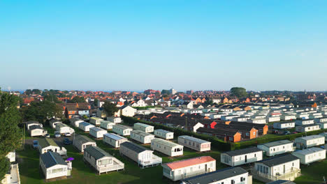 Experience-the-beauty-of-Skegness's-holiday-parks-with-this-aerial-video,-highlighting-caravans,-holiday-homes,-and-the-picturesque-countryside-on-a-summer-evening
