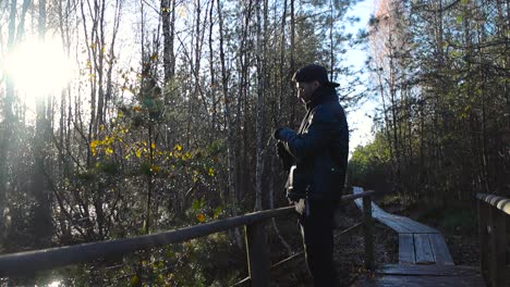 Man Hiking in a Peaceful Forest