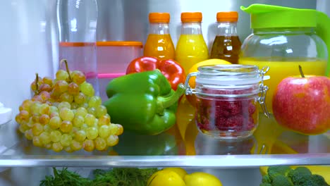 Open-refrigerator-filled-with-food