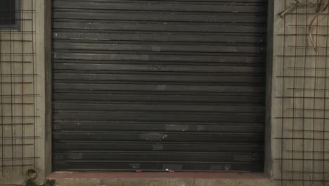 local small business female owner opening shop door. woman entrepreneur standing at flower store at street level