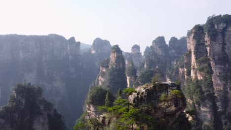 Aerial-view-of-Zhangjiajie-stone-pillars-at-sunrise-time