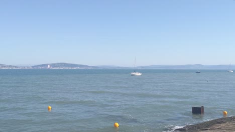 Yachts-and-Boats-Anchored-in-Bay-on-Hot-Summers-Day