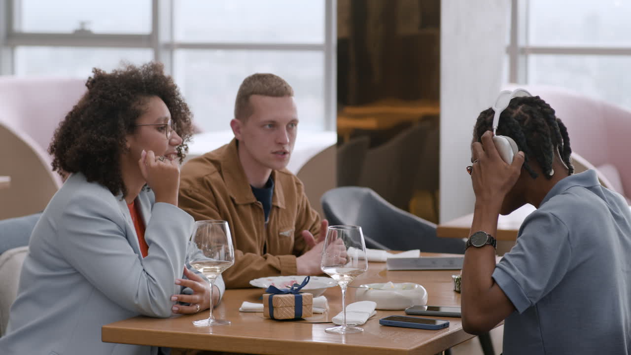 Friends Enjoying a Meal and Conversation