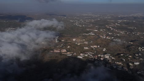 Aerial-flying-towards-Abha-city,-Saudi-Arabia.-Descending