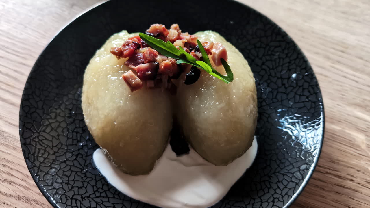 Delicious cepelinai dish served in Lithuania restaurant