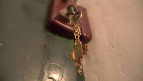 close up of beautiful and antic key in lock