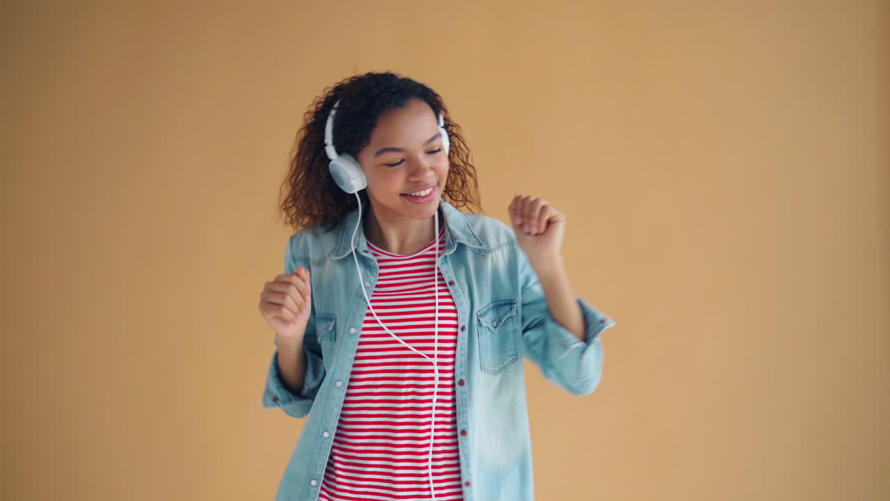 Woman Dancing to Music