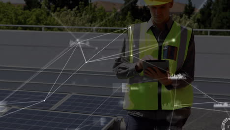 animation of network of connections over solar panels and male engineer using tablet in background