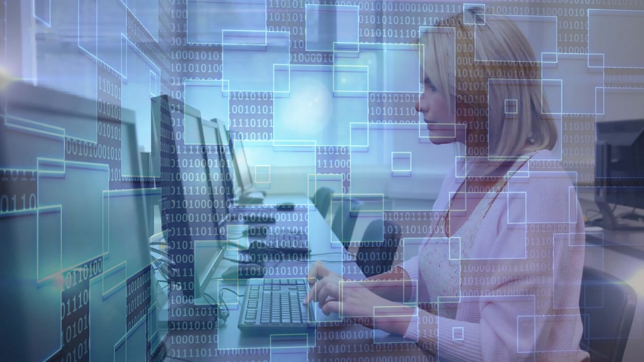 Female tech worker starting typing on keyboard activating binary overlays for data security smiling