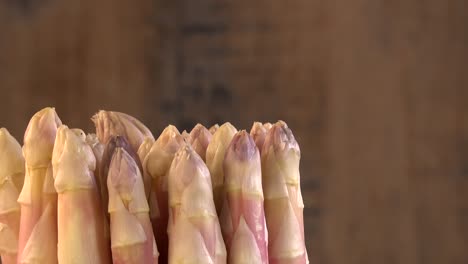 portion of fresh white asparagus on turn table