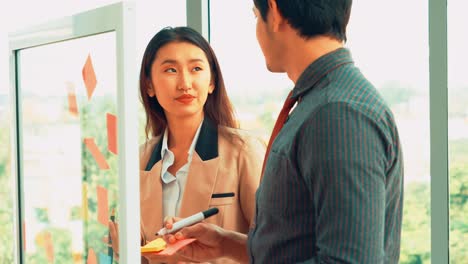 business people work on project planning board