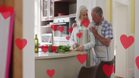 animation of falling hearts icons over senior couple