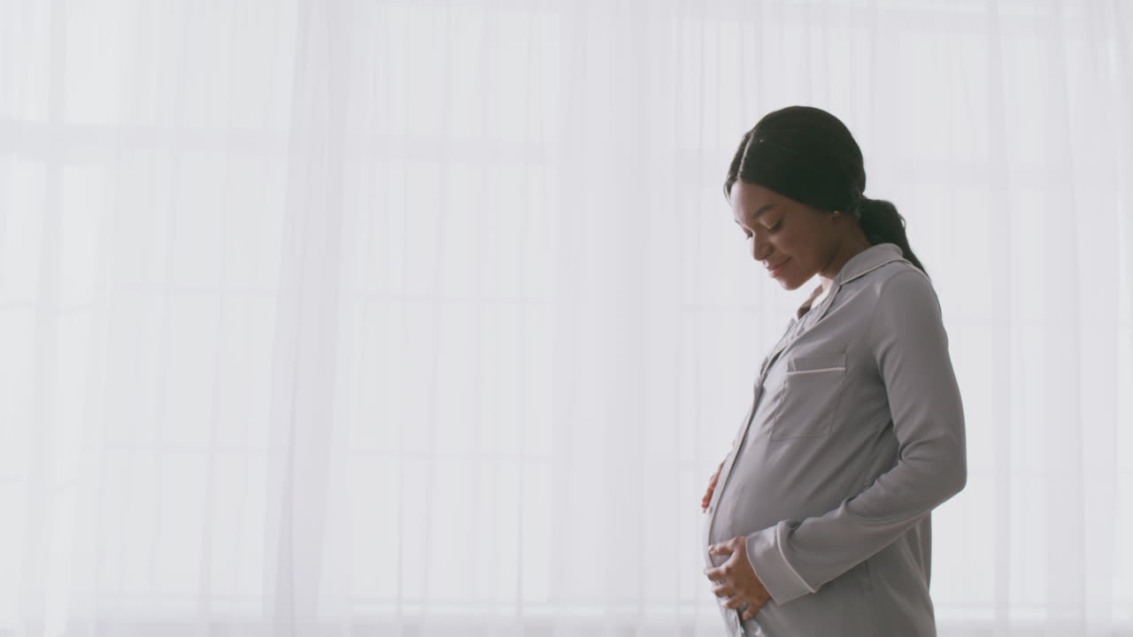 Pregnant Woman in Pajamas