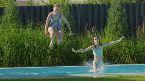 kids jumping in a pool